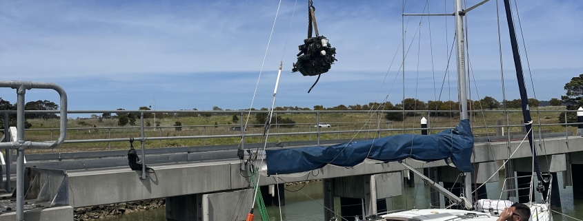 A new marine engine being installed in a sailing yacht.